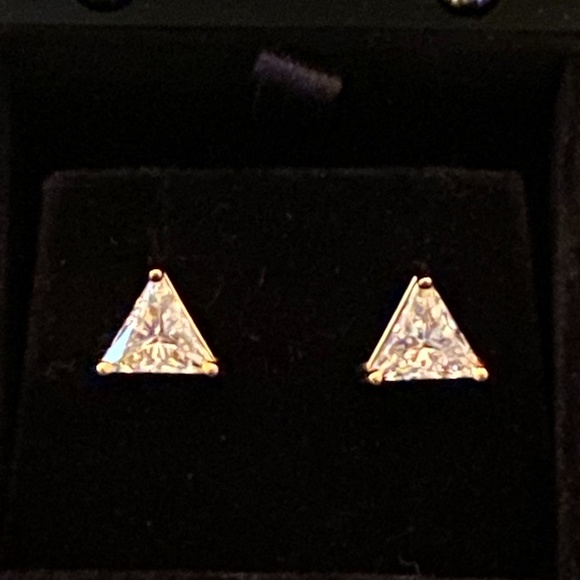Trillion cut studs put a spunky spin on classic studs. The triangle shape and ro - Picture 1 of 6